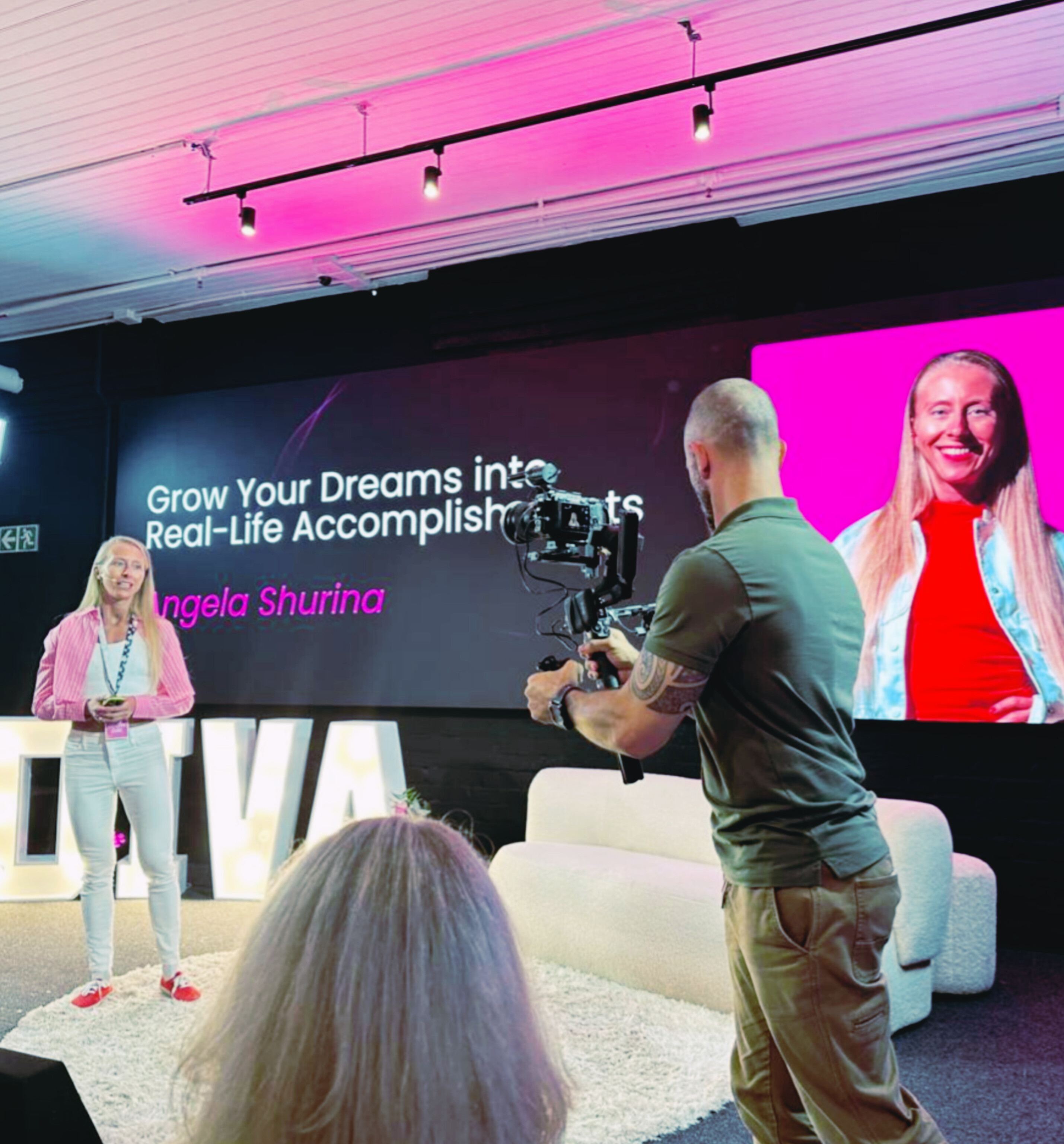 Angela speaking on stage